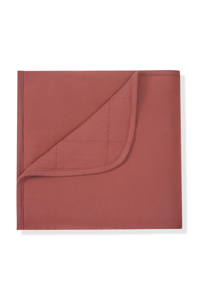 Baby Blanket in Ember on a white background