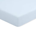 Mini Crib Sheet in Breeze shown on a mattress