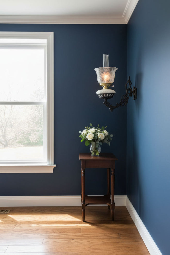 Bracket lamp makes a striking appearance on blue walls - Paxton Hardware